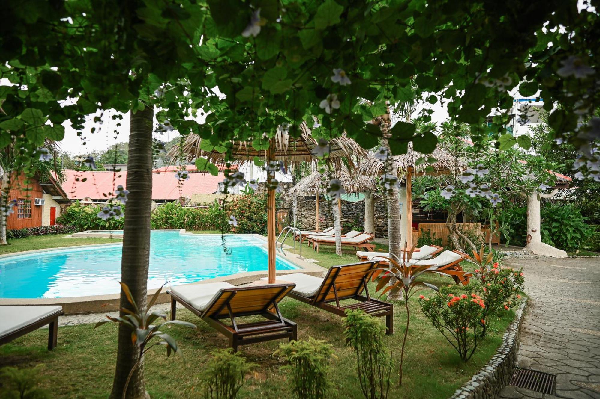 Garden Of Eden Dive Resort Puerto Galera Exteriör bild